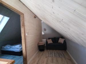 Łóżko lub łóżka w pokoju w obiekcie Domek Sworne Zacisze