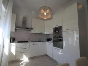 Kuchyňa alebo kuchynka v ubytovaní Apartment Giulia by Interhome