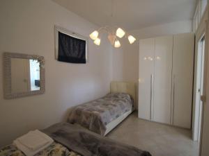 Posteľ alebo postele v izbe v ubytovaní Apartment Giulia by Interhome
