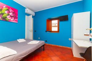 Voodi või voodid majutusasutuse Affittacamere Grugliasco Ressia toas