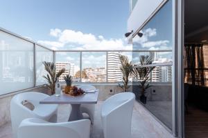 Balkon oz. terasa v nastanitvi Exe Oriental Panamá