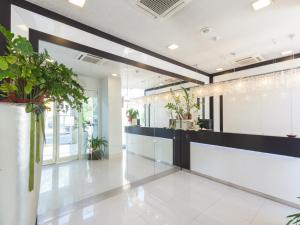 The lobby or reception area at Suite Hotel Elite