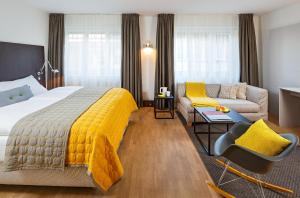 Postelja oz. postelje v sobi nastanitve Hotel Rössli