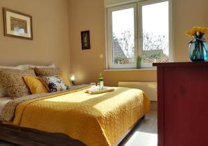 Giường trong phòng chung tại Villa Aurea