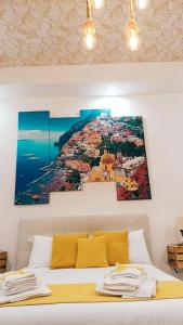 Posteľ alebo postele v izbe v ubytovaní I Tesori di Napoli
