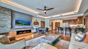 a living room with a fireplace and a table at Zalanta 221 in South Lake Tahoe