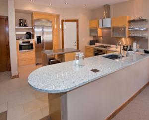 a kitchen with a large counter top in a kitchen at Osprey 303 in Beaver Creek