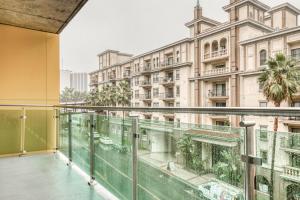 a balcony with a view of a building at Downtown 1BR w Pool Gym WD nr Staples Center LAX-547 in Los Angeles