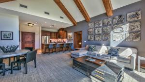 a living room with a couch and a table at Luxury 2Br Residence Steps From Heavenly Village & Gondola Condo in South Lake Tahoe