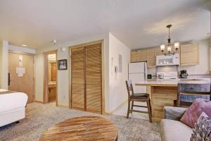 a room with a kitchen and a living room at Village at Breck V4224 in Breckenridge