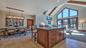 a kitchen and dining room with a table and chairs at Zalanta 317 in South Lake Tahoe