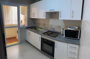 Cuisine ou kitchenette dans l'établissement Aida village