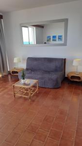 Ein Sitzbereich in der Unterkunft Ma vue mer en Algarve