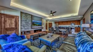 a living room with a couch and a table at Luxury 3Br Residence Steps From Heavenly Village & Gondola Condo in South Lake Tahoe
