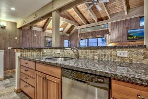 a kitchen with a sink and a stove at 511 Pine Grove in South Lake Tahoe