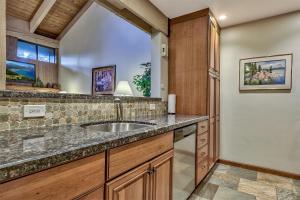 a kitchen with a sink and a counter at 511 Pine Grove in South Lake Tahoe