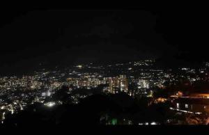 a view of a city at night with lights at Lujoso apartamento en envigado,con hermosa y exclusiva vista in Envigado
