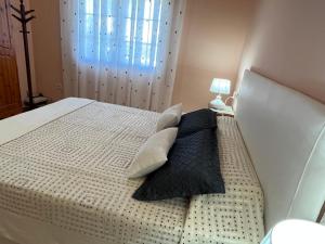 Posteľ alebo postele v izbe v ubytovaní Villa Lluna