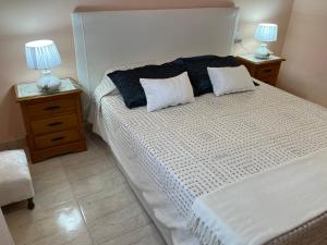 Posteľ alebo postele v izbe v ubytovaní Villa Lluna
