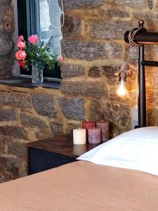 A bed or beds in a room at by karakas Λίθινο