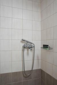 A bathroom at Cozy Studio at Ampelokipi Area