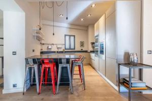Kuchyňa alebo kuchynka v ubytovaní Appartement 100M2 dernier étage - chambre atypique