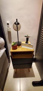 a desk with a toy ship on top of it at StudioRD Copacabana 250m da praia esquina com a Rua do Copacabana Palace Rodolfo Dantas in Rio de Janeiro +110 photos
