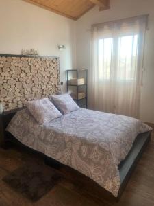 Łóżko lub łóżka w pokoju w obiekcie Appartement de montagne cosy