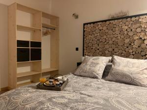 Łóżko lub łóżka w pokoju w obiekcie Appartement de montagne cosy