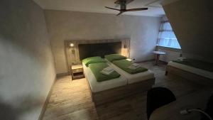 Ein Bett oder Betten in einem Zimmer der Unterkunft Hotel MyLord