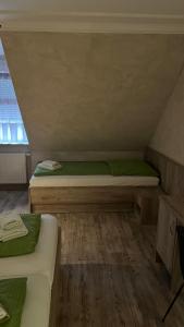 Ein Bett oder Betten in einem Zimmer der Unterkunft Hotel MyLord
