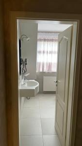 Ein Badezimmer in der Unterkunft Hotel MyLord
