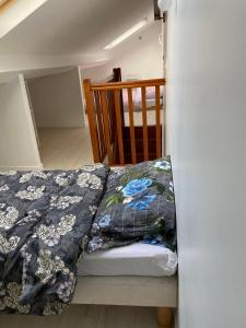 Posteľ alebo postele v izbe v ubytovaní Appart95 Saint-Brice CDG France