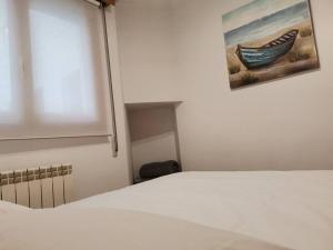 Łóżko lub łóżka w pokoju w obiekcie Apartamento Plaza America 40 m2