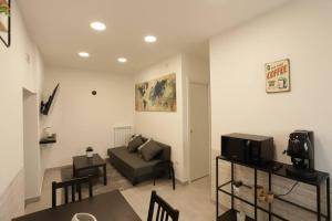A seating area at Santa Chiara Luxury House
