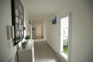 A television and/or entertainment centre at Santa Chiara Luxury House