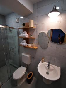 Uma casa de banho em Guest House Relić
