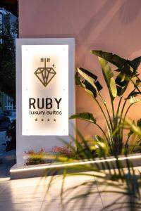 a sign for the ryuikiiki studios at Ruby Luxury Suites in Chania