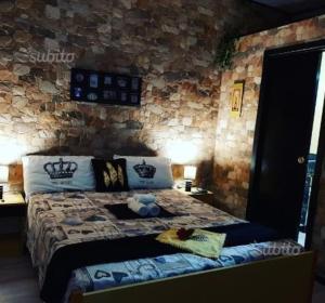 Ένα ή περισσότερα κρεβάτια σε δωμάτιο στο Borgo Antico Luxury Flats - Domus Aurea