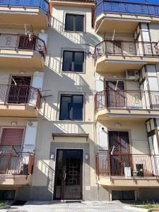 a building with balconies on the side of it at LOFT ORTENSIA in Pompei