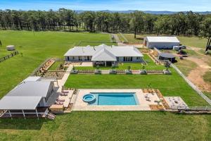 an aerial view of a large estate with a pool at Luxury Hunter Valley Estate in Lochinvar