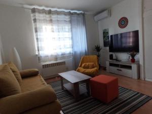 TV a/nebo společenská místnost v ubytování Folka cozy apartment