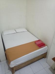 Voodi või voodid majutusasutuse Losmen Fadel Malioboro Jogja toas