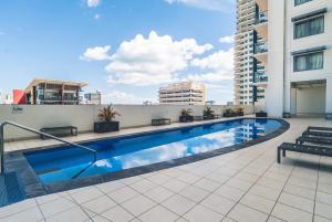 a swimming pool on the roof of a building at ZEN OCEAN BLISS - Cozy 2-BR/2-BA Sea View Retreat in Darwin