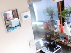 Kuchyň nebo kuchyňský kout v ubytování Whole house rental 一棟貸切宿 "Your Home Tottori" 市内中心地近くの素敵な一軒家