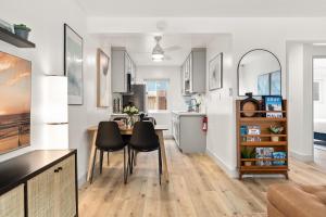 a kitchen and dining room with a table and chairs at Central Apartment in a Hip Walkable Neighborhood NRP23-01143 in Long Beach