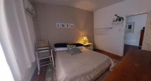 Posteľ alebo postele v izbe v ubytovaní Lindo quarto casal no centro Floripa