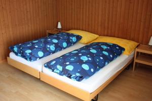 Postel nebo postele na pokoji v ubytování Hotel Restaurant Koi-Gartenteich