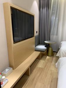 Postel nebo postele na pokoji v ubytování Meego Smart Select Hotel