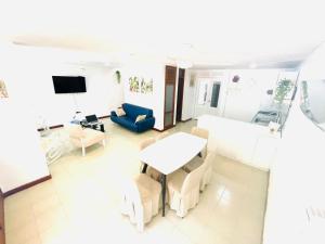 Televisyen dan/atau pusat hiburan di Uchuva beach house